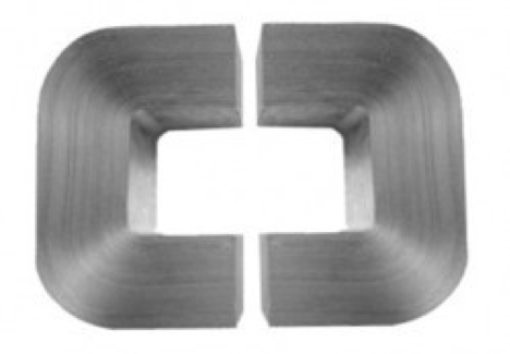 Two stacks of silver-colored amorphous steel metal, in the shape of a “u,” facing one another, forming an open oval.